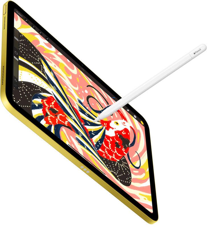 iPad, Procreate uygulamasında renkli bir balık illüstrasyonunu gösteriyor, Apple Pencil, iPad’in üzerinde çizim yapıyor 