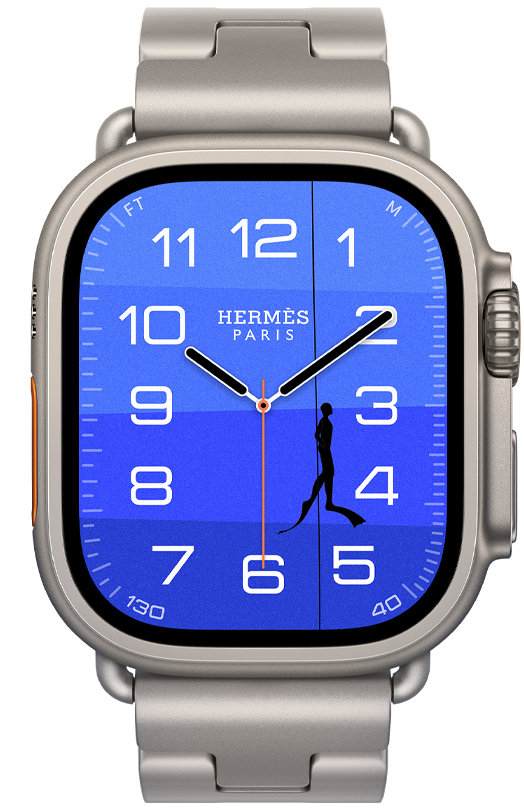 Apple Watch Hermès Ultra 4, carátulas analógicas Fathom y Wonder (agujas de hora, minuto y segundo, complicación Profundidad, con una boya naranja flotando sobre un océano turquesa con degradado de azul claro a oscuro), caja de titanio, natural, parte lateral derecha, Digital Crown, botón lateral en relieve, con la correa Grand H Titane, color Gris Titane