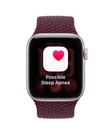 Apple Watch SE 3, aluminum case, starlight colour, screen shows health tracking (possible sleep apnea notification), right side exterior, Digital Crown dial, Braided Sport Loop band, burgundy colour