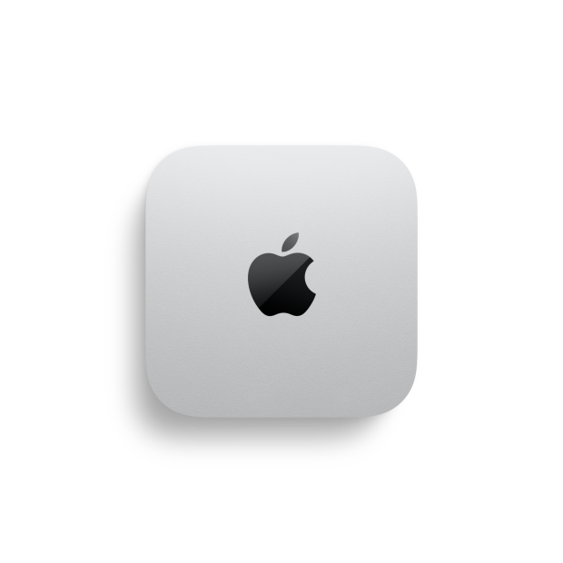 Mac mini 的俯視圖，裝置左側和底部標示著 12.7 公分的尺寸，展示銀色鋁金屬機身、方形圓角設計，以及機身中央的黑色亮面 Apple 標誌